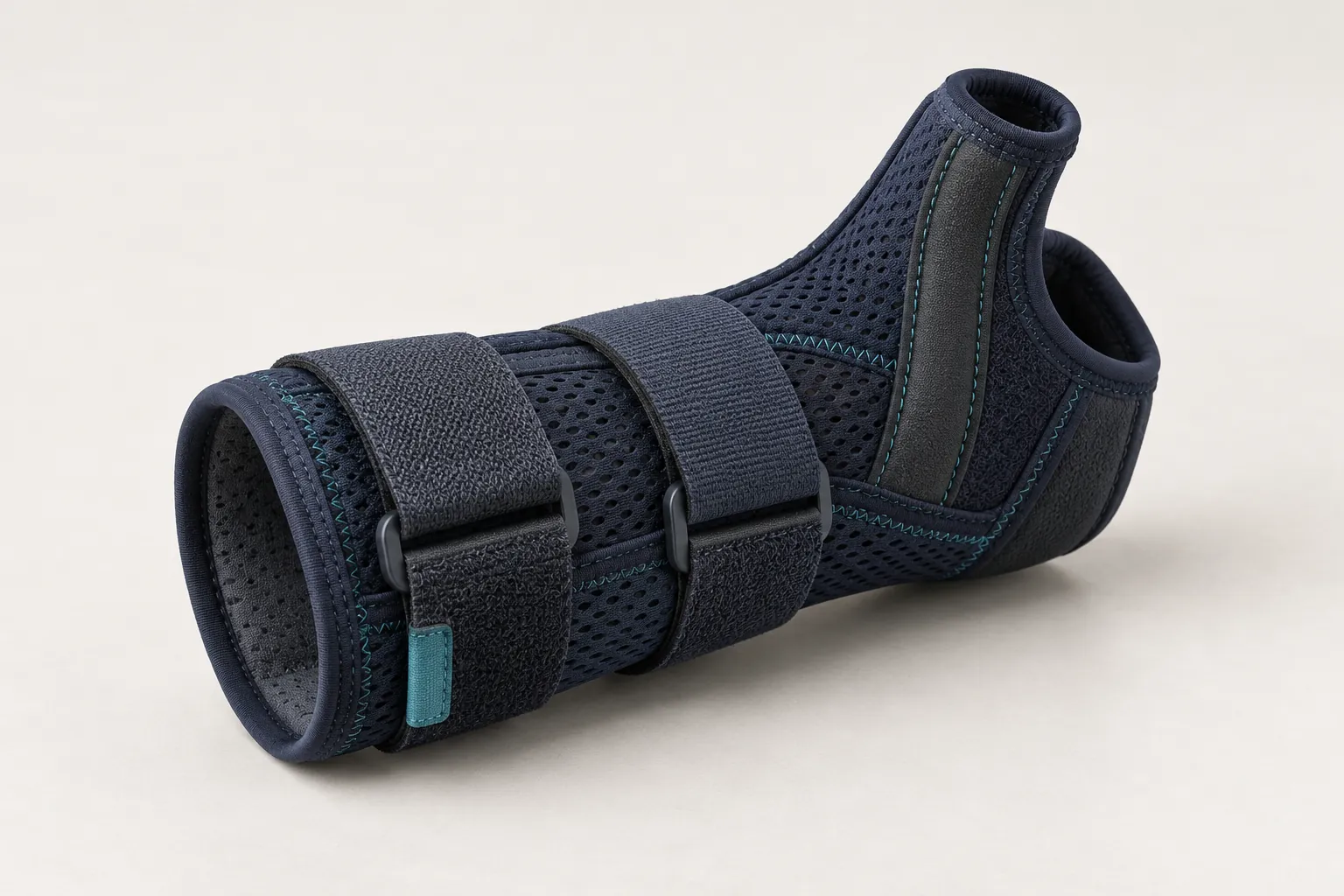 Navy wrist and thumb support with adjustable straps